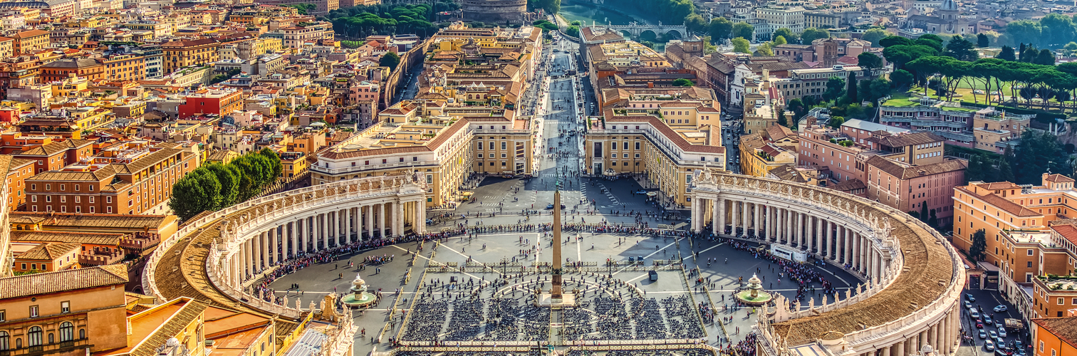 Famous Saint Peter's Square in Vatican and aerial view of the Ro