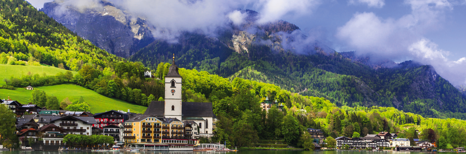 Amazing idyllic scenery. Lake Sankt Wolfgang in Austria. Boat ri