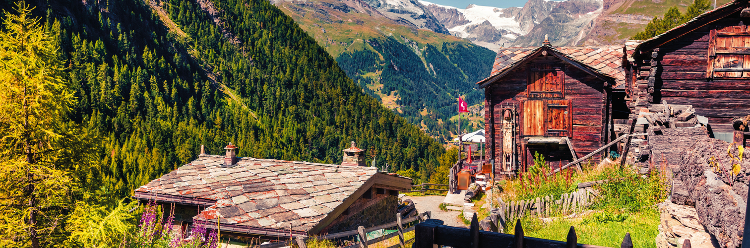 Sunny summer morning in Zermatt village with Matterhorn (Monte C