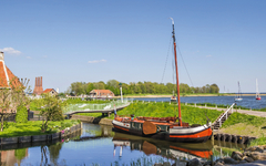 Panorama of a sailing ship at a dike in Enkhuizen