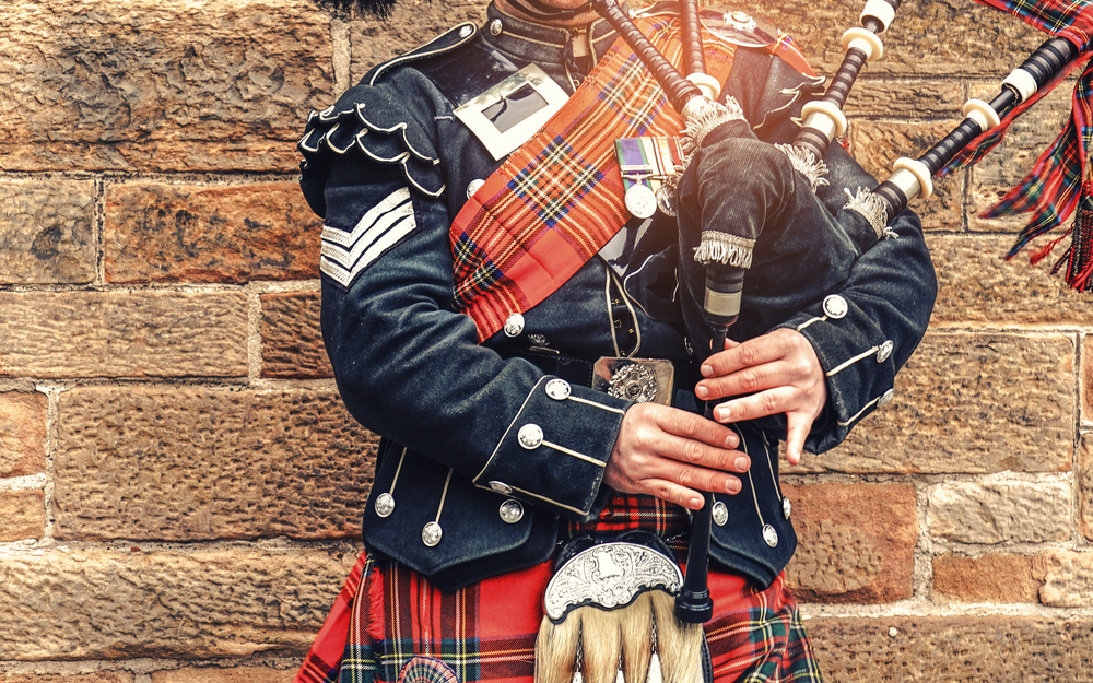 EDINBURGH, SCOTLAND, 24 March 2018 , Scottish bagpiper dressed i