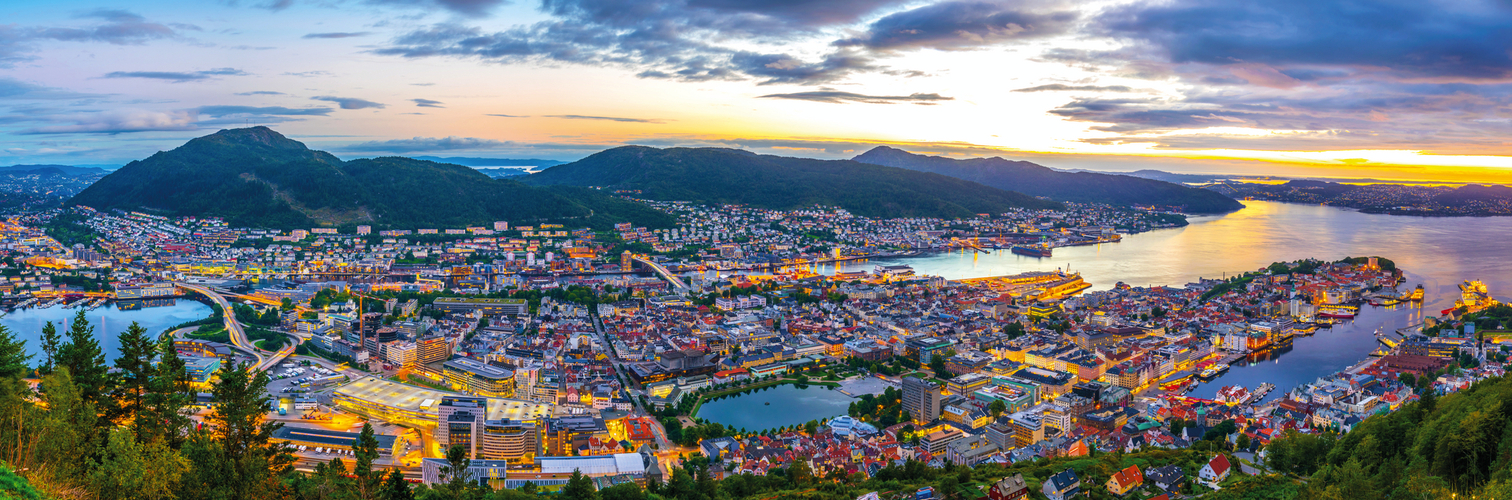 Sunset view on Bergen and harbor from the mountain floyen