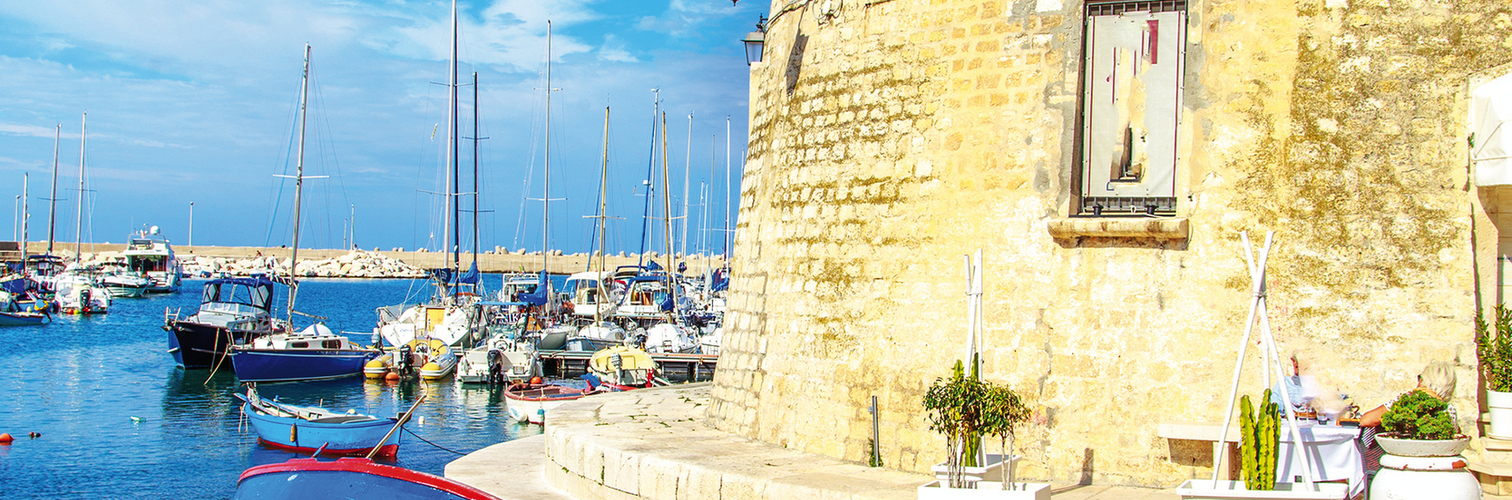 Fishing boats in small port Giovinazzo near Bari, Apulia, Italy