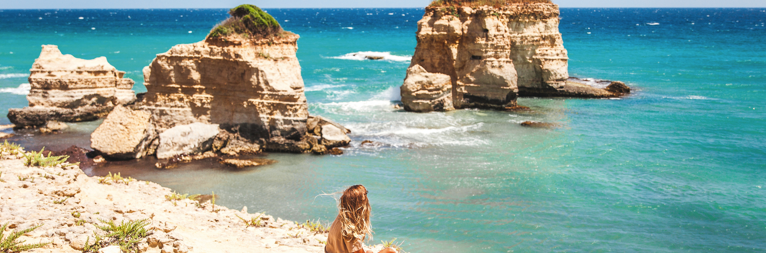 woman alone looking at the sea